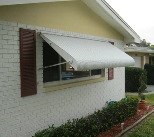 Clamshell Awnings - factory-direct hurricane protection by Hurricane Shutters Florida